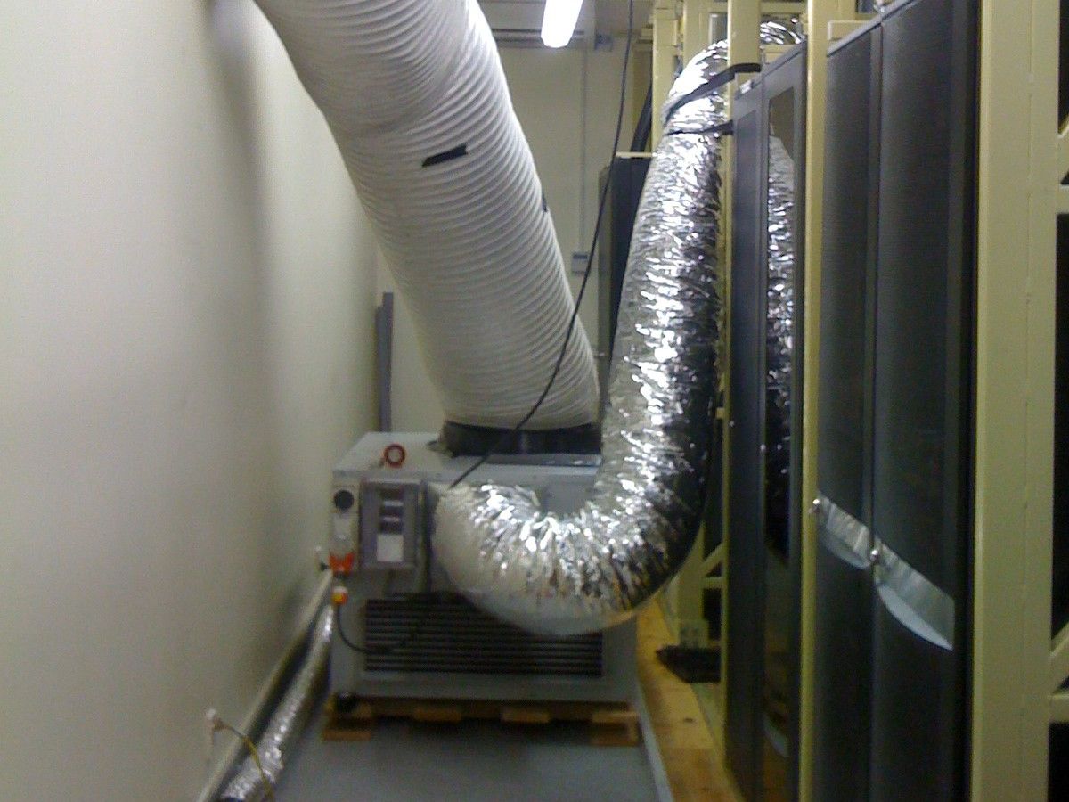 A 10 kW unit cooling a comms room, ducted alongside the equipment racks